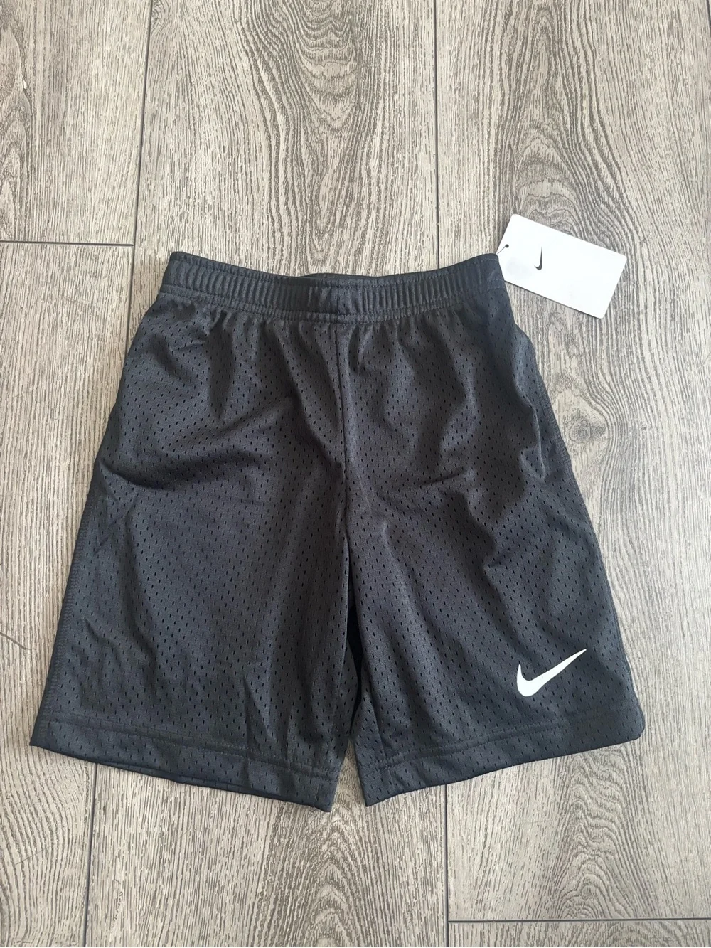 Nike Black Athletic Shorts with White Swoosh